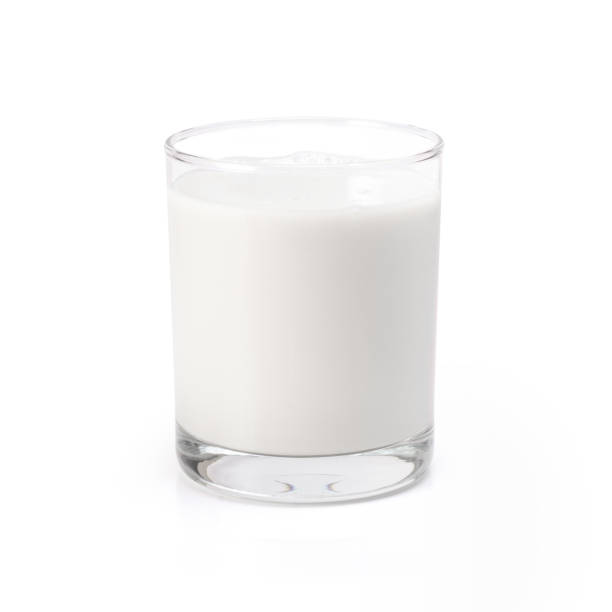 istock Glass of fresh milk isolated on white 1309200726