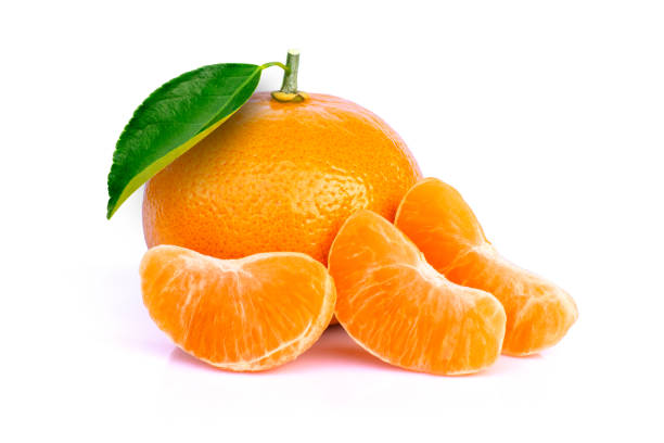 istock Tangerine or clementine orange fruit with green leaf 1309200787
