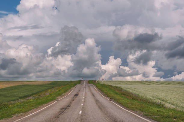 istock road field buckwheat clouds sky overcast 1309202426
