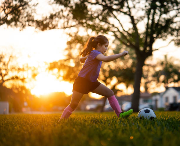 istock Cuban girl practicing soccer skills 1309205377