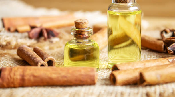 istock Star anise and cinnamon oil in a bottle. Selective focus. 1309211994