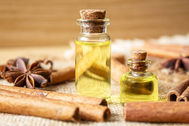 istock Star anise and cinnamon oil in a bottle. Selective focus. 1309211995