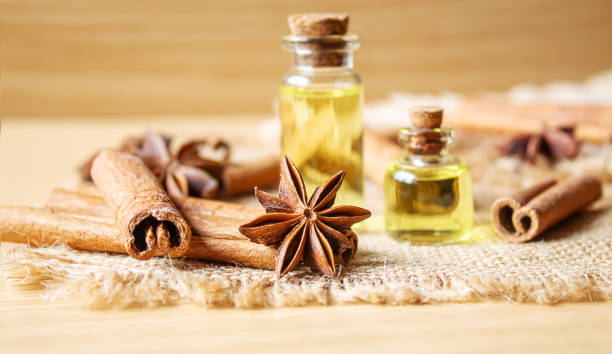 istock Star anise and cinnamon oil in a bottle. Selective focus. 1309212013