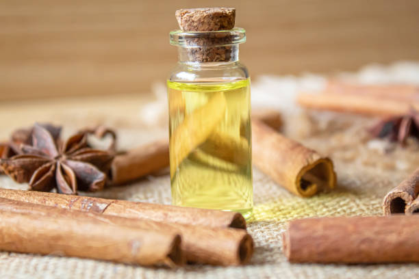 istock Star anise and cinnamon oil in a bottle. Selective focus. 1309212017