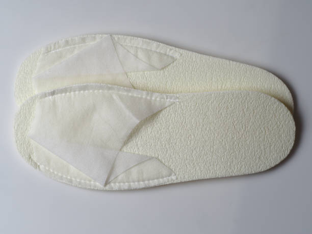 istock white disposable plastic slippers from the hotel set 1309212145