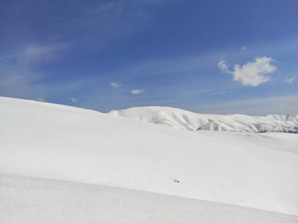 istock High mountain landscape with sun 1309224015