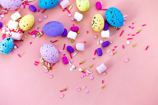 Decoration Happy Easter holiday background concept. Colorful bunny eggs on beautiful pink desk