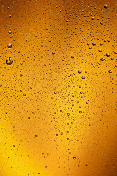 istock Beer Background. Ice Cold Beer Glass With Water Drops Condensation 1309228077
