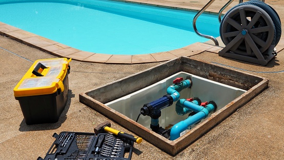 Tools and equipment for fixing swimming pool water pump. Service and maintenance for swimming pool.