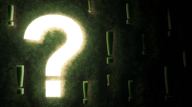 istock Illuminated Question Mark Among Exclamation Marks over a Grassy Area with Dry Patches 1309229542