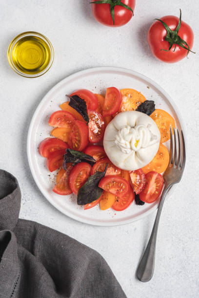 istock Tomato salad with burrata cheese 1309232283