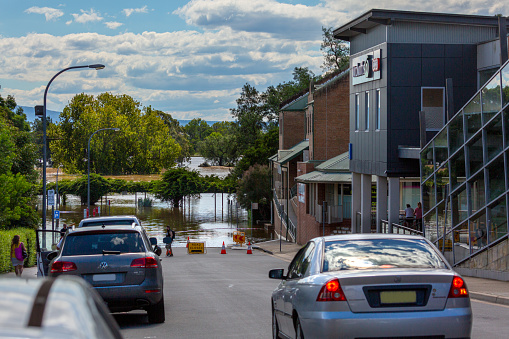 Windsor, NSW, Australia - March 24, 2021;  When the Hawkesbury river burst its banks in a major flooding event and rose up the hills to the shopping centre.  Many homes, vehicles and businesses downstream have lost everything.