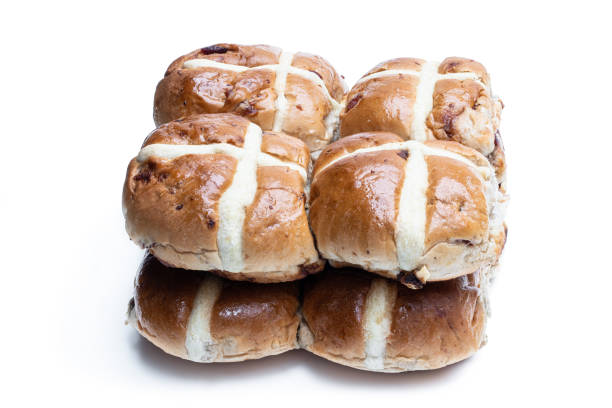 istock Easter wholemeal hot cross buns isolated on white background 1309234448