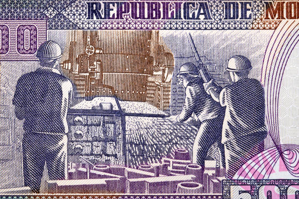 istock Three steelworkers on money from Mozambique 1309237574