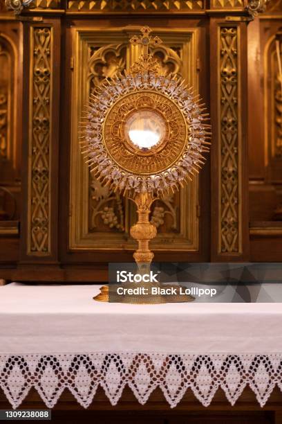 Golden Ostensorium In The Roman Catholic Church Stock Photo - Download Image Now - Ostensorium, Religious Mass, Catholicism