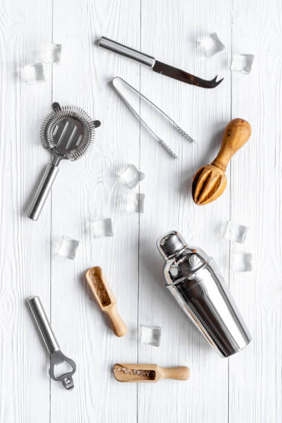 istock Bar tools and utensils for cocktail - with shaker, strainer and ice 1309238545