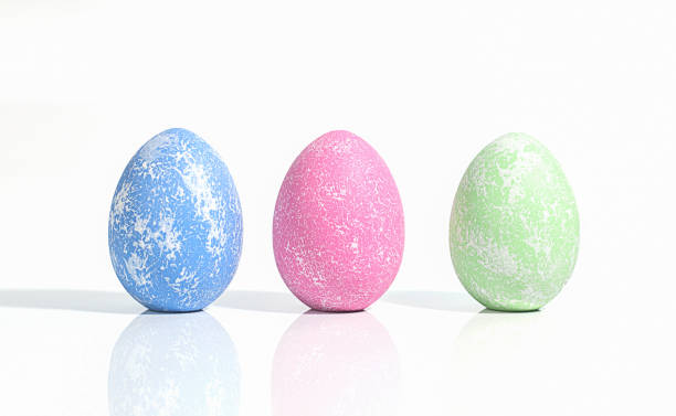 istock Easter blue, pink and green colored decorated eggs stand in a row on white background. with reflection. Minimal easter concept. Happy Easter card with copy space for text. Banner. 1309241000