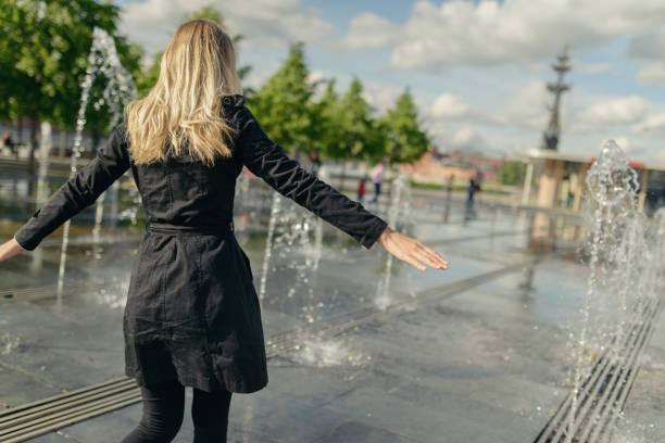istock Woman enjoys the spring sun. 1309241096