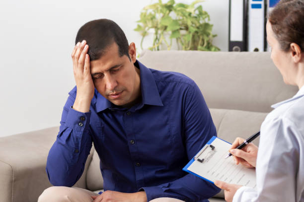 istock businessman in psychiatrist's office 1309242340