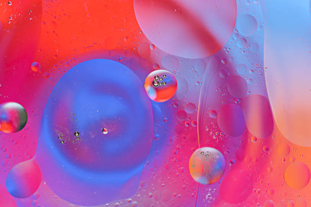 istock colorful bubbles and smears of oil drops on water surface on colored background 1309242519