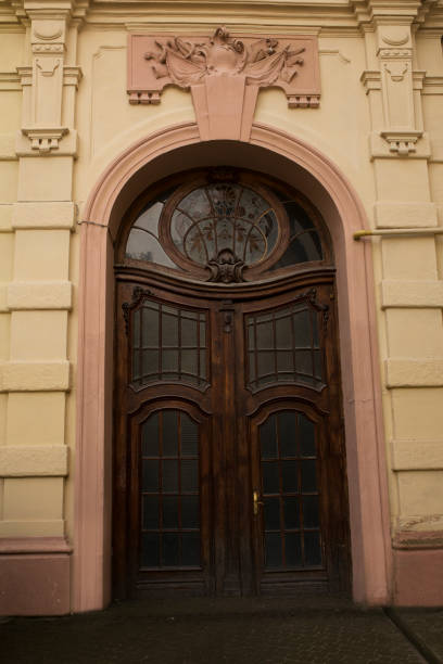 istock Arched door with stained glass window 1309243529