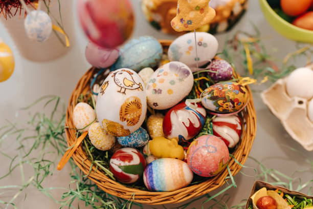 istock Easter eggs in wooden basket 1309247348
