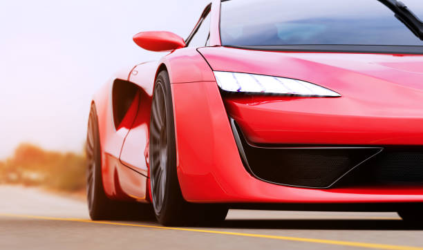 istock red sportscar driving on a road 1309250077