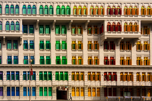 Singapore  May. 2,  2019: MICA building in Singapore. It was known as the Old Hill Street Police Station. This building has a total of 927 windows and are painted in the rainbow color.