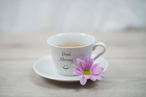istock Morning coffee with a smile and a flower. 1309254767