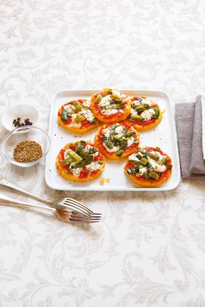 istock Polenta pizza with tomato mozzarella and leeks 1309254809