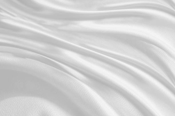 istock white satin fabric,abstract background luxury white cloth. 1309258511