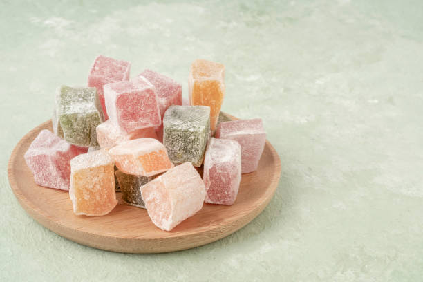 istock colorful Turkish delights on the plate on green 1309262291