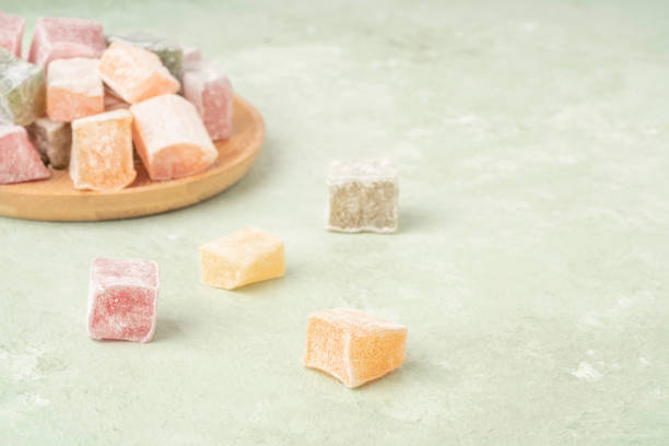 istock colorful Turkish delights on the plate on green 1309262292