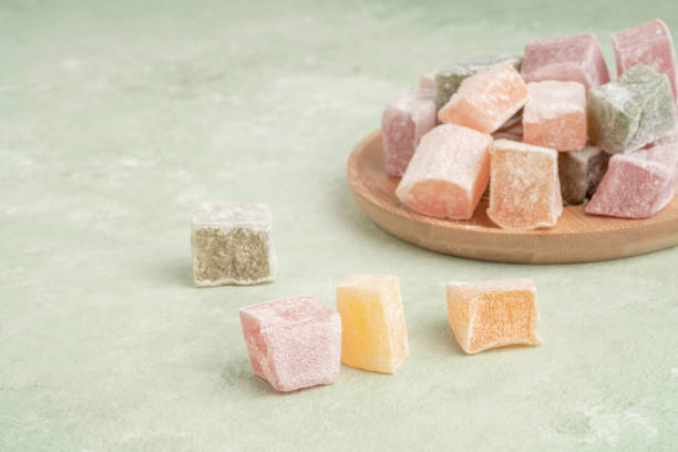 istock colorful Turkish delights on the plate on green 1309262297