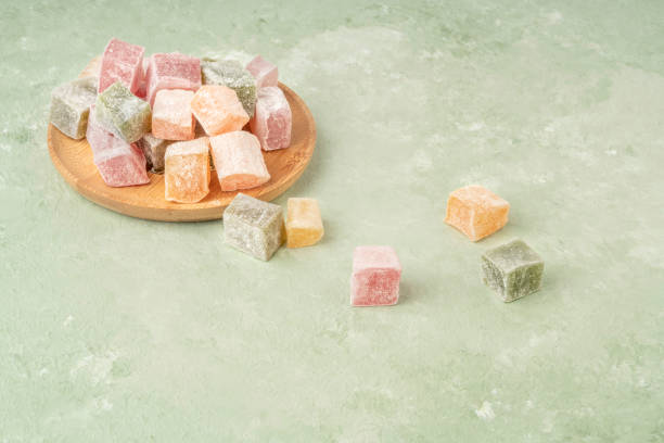 istock colorful Turkish delights on the plate on green 1309262303