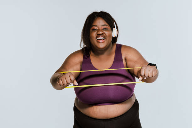 istock Young woman making pilates and functional training at the gym 1309263758