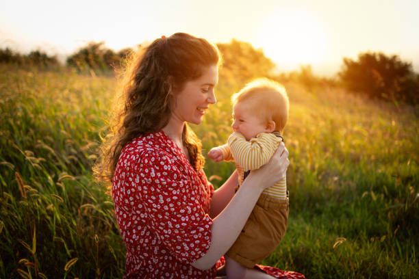 istock Smiling mother and her baby boy 1309266165