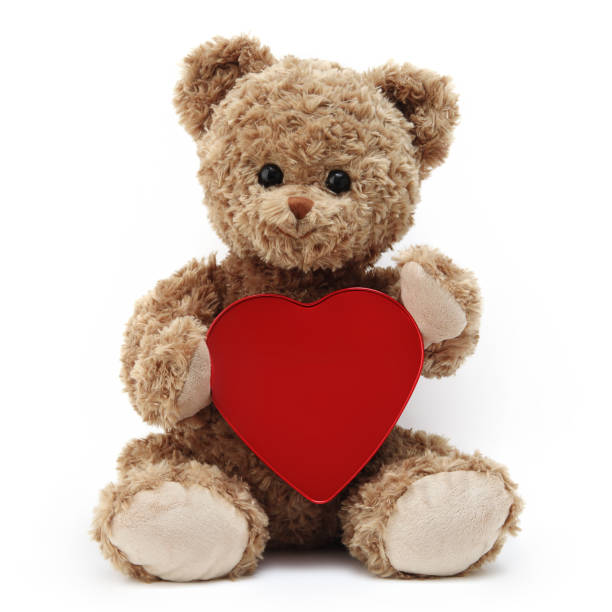 istock teddy bear with red heart isolated on white background 1309273507
