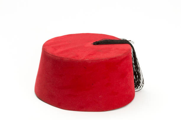 istock Red fez (Tarboosh) with black tassel isolated in white background. 1309273522