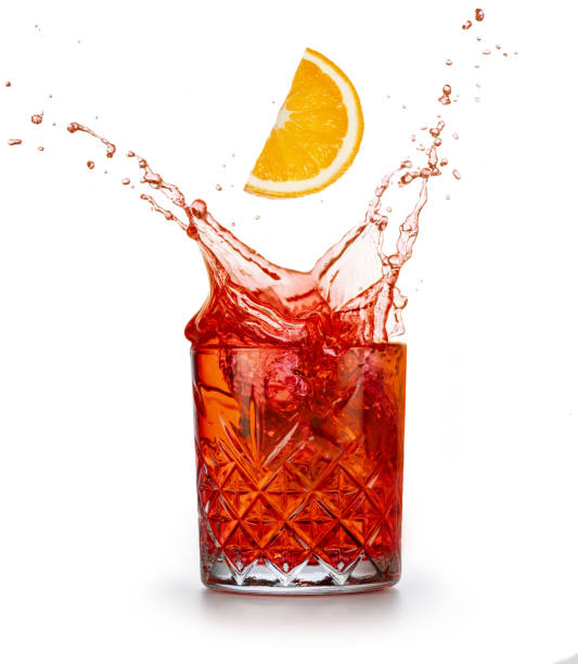 istock Negroni cocktail splashing on white 1309273577