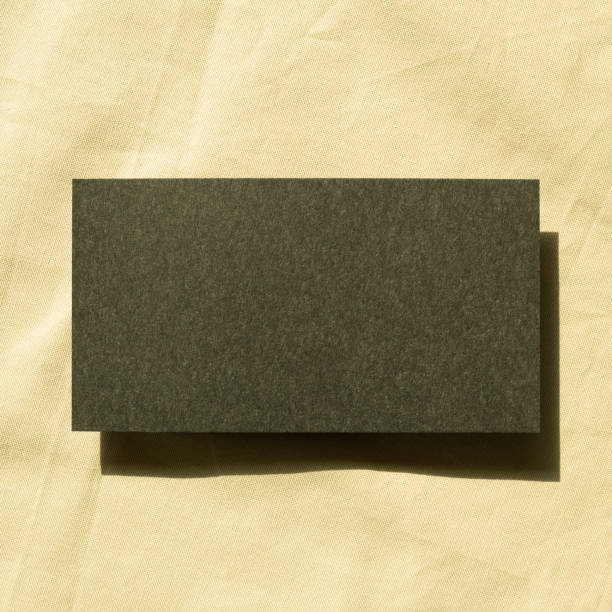 istock Blank memo pad, empty paper on fabric background. top view, copy space 1309273694