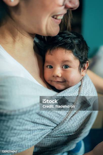 Baby Is Always Close To Mom Stock Photo - Download Image Now - Baby Carrier, Baby - Human Age, Carrying