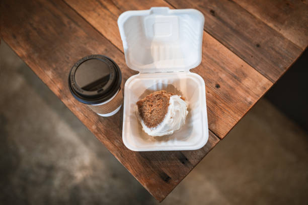 istock Fresh Slice of Carrot Cake In Takeout Container With Coffee 1309274211
