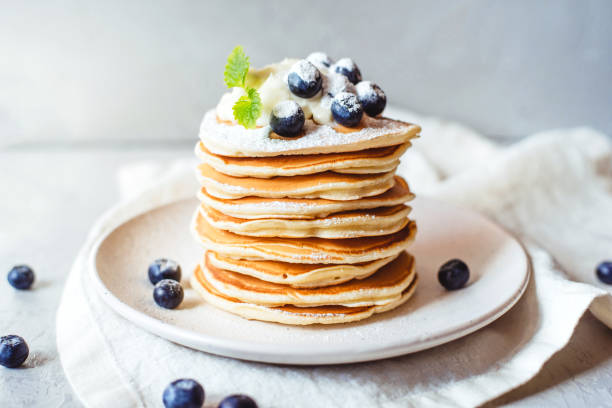 istock A stack of delicious pancakes with fresh blueberry. 1309274288