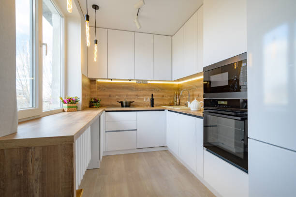 Modern white and beige wooden kitchen interior