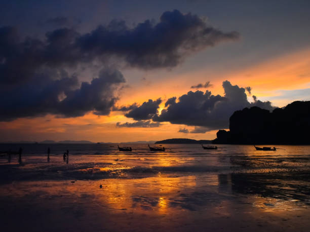 istock Sunset over sea shore beach in Thailand 1309277695