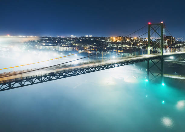 Free Stock Photo of Illuminated bridge at night over water | Download ...