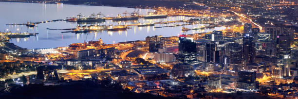 Aerial, twilight panoramic of downtown Cape Town, harbor and Tab stock photo