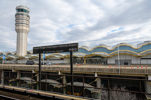 View from the Ronald Reagan Washington National Airport metro station, looking toward the terminal and control tower at the airport, on January 19, 2021.