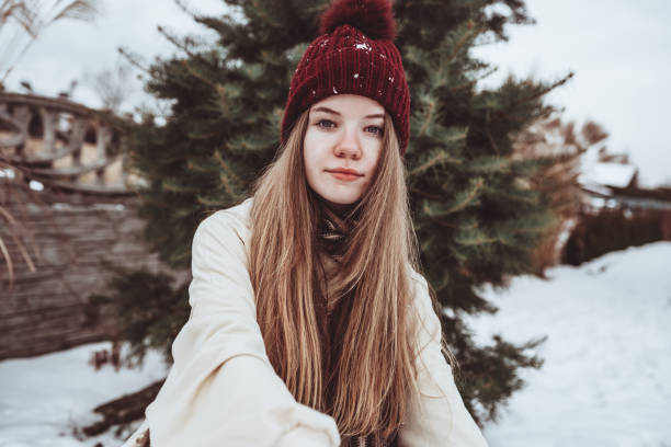 istock Confident teenager in a winter hat 1309284417